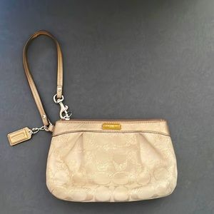 Coach gold/metallic wristlet